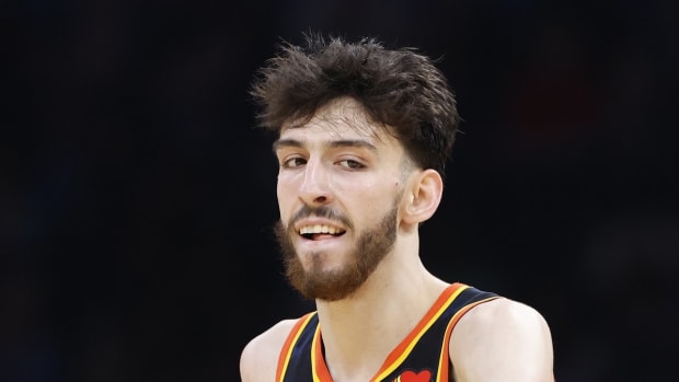 Feb 4, 2024; Oklahoma City, Oklahoma, USA; Oklahoma City Thunder forward Chet Holmgren (7) celebrates after guard Luguentz Dort (5) scored a three point basket against the Toronto Raptors during the second half at Paycom Center. 